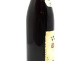 a bottle of wine that is sitting on a table