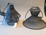 two lamps that are sitting on a table