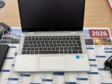 a laptop computer sitting on top of a calendar