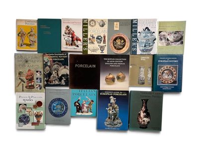 a lot of books that are sitting on a table