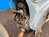 a close up view of a motorcycle with the front end of it ' s engine