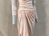 an image of a mannequin dressed in a pink dress