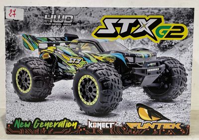 une boîte contenant un monster truck télécommandé