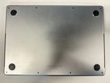 a close up of a metal surface with two holes on it