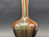 a vase that is sitting on a table