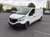 a white van that is parked in a parking lot
