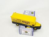 a toy truck that is sitting on top of a box