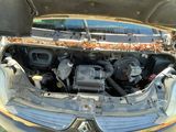 the engine of a car with its hood open and the hood open