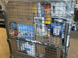 a metal cart with a bunch of items on top of it