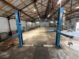 a large garage with a lot of equipment in it