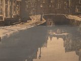 a picture of an old picture of a canal in the middle of town