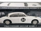 the box is open to show the model of a white jaguar mark 2