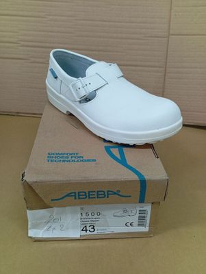 a white shoe that is on top of a box