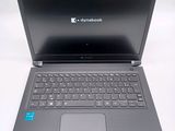 a laptop that has a keyboard on top of it