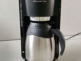 a coffee maker that is sitting on a counter