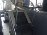a tread machine in the middle of the room