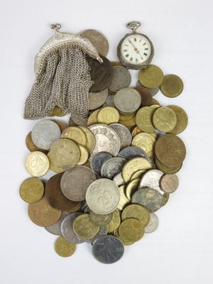 a bag full of coins and a clock on the table