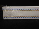 a white box with a blue and white design on it