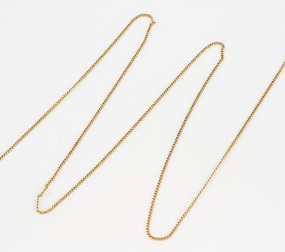 a gold chain necklace with a heart pendant on it