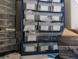 a desk with a lot of boxes on top of it