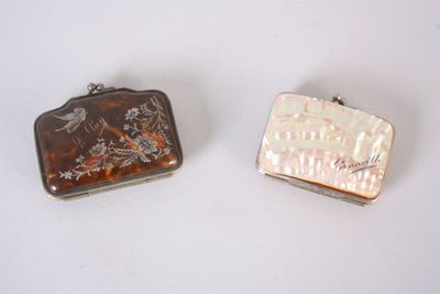 pair of mother of pearl and mother of pearl purses