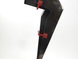 sculpture of a black sculpture with a red handle on a black base