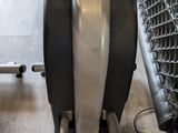 a machine that is sitting on the floor in the gym