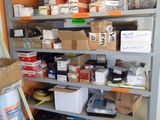 many boxes and boxes on the shelves in the room