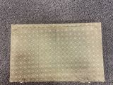 a close up of a piece of cloth on a carpet