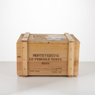 a wooden box with a picture on it on a table
