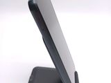 a close up of a cell phone on a stand