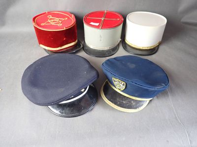three hats are sitting next to each other on a table