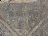 a close up of a stone with writing on it