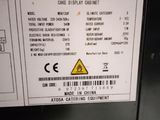 a label on a machine that says cake display cabinet