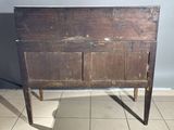 an old wooden table with a drawer on top of it