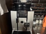 a coffee machine sitting on a counter in a kitchen
