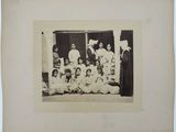 an old black and white photo of a group of women and children