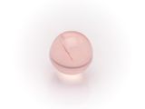 an image of a pink glass ball on a white surface