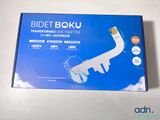 an image of a blue box with a picture of a hand holding a cell phone