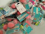a pile of pink and blue bath bombs on a table