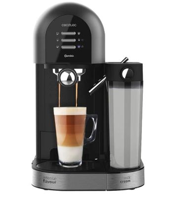 a black coffee machine with a cup of coffee in front of it