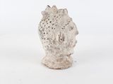 small white ceramic sculpture of a head on a white background