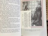 an open book with a picture of a man on it