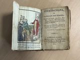 an old book with a picture of a man and a woman on it