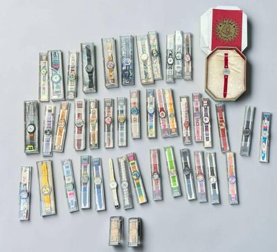 a lot of toothbrushes and toothpaste in a box