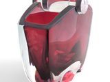 a glass vase with a red and white design on it