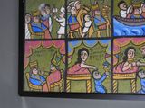 a painting on the wall of a room with pictures on it