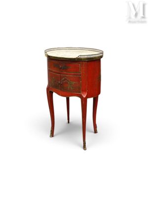 une image représentant une petite table rouge avec un plateau en marbre