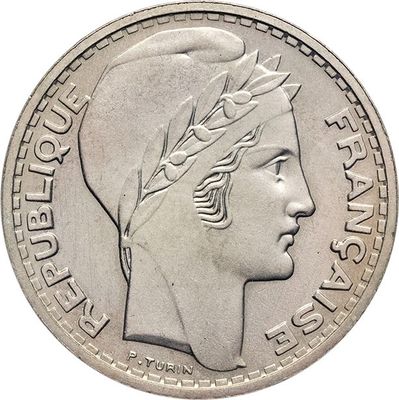 l'image d'une pièce de monnaie sur laquelle figure une tête de femme