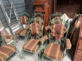 a lot of chairs that are sitting in a room